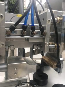 Ultrasoinu zigilatzeko hodi kosmetikoak betetzeko makina