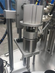 Ultrasoinu zigilatzeko hodi kosmetikoak betetzeko makina